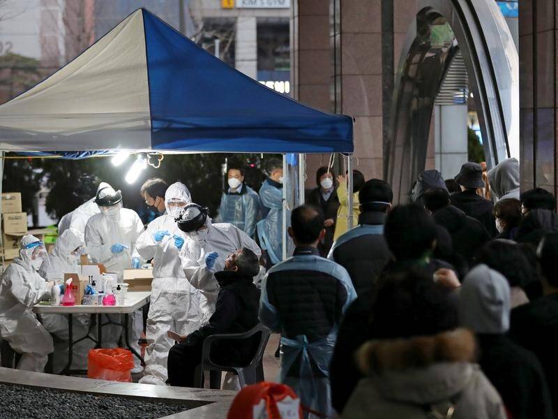 Medical personnel have checked employees of an insurance firm call centre in Seoul.